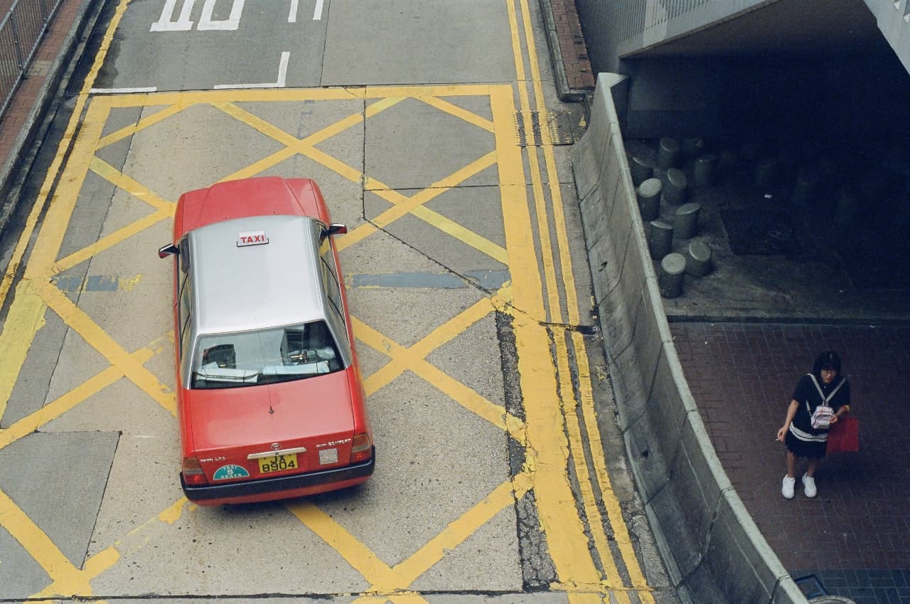 2 - red taxi daytime